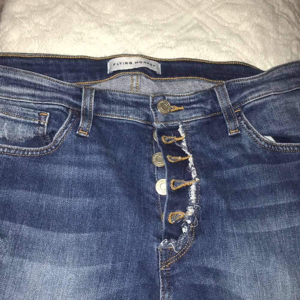 Multiple button flying monkey jeans